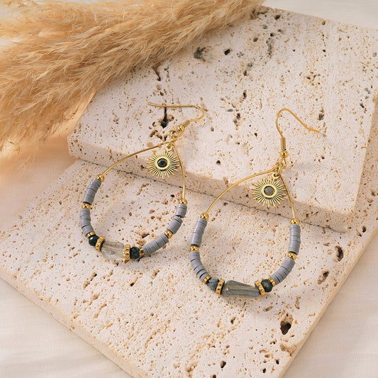 Hoepel Oorbellen met Zon Hanger – Warm en Stralend | Twinolo