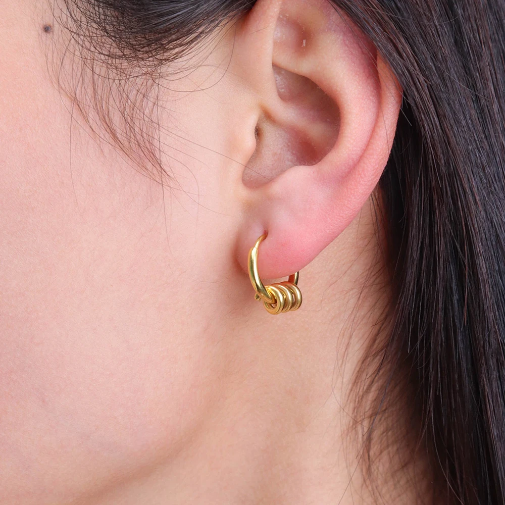 Boucles d'Oreilles Créoles Torsadées – Détail Unique | Twinolo