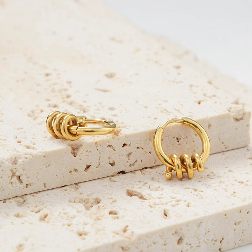 Boucles d'Oreilles Créoles Torsadées – Détail Unique | Twinolo