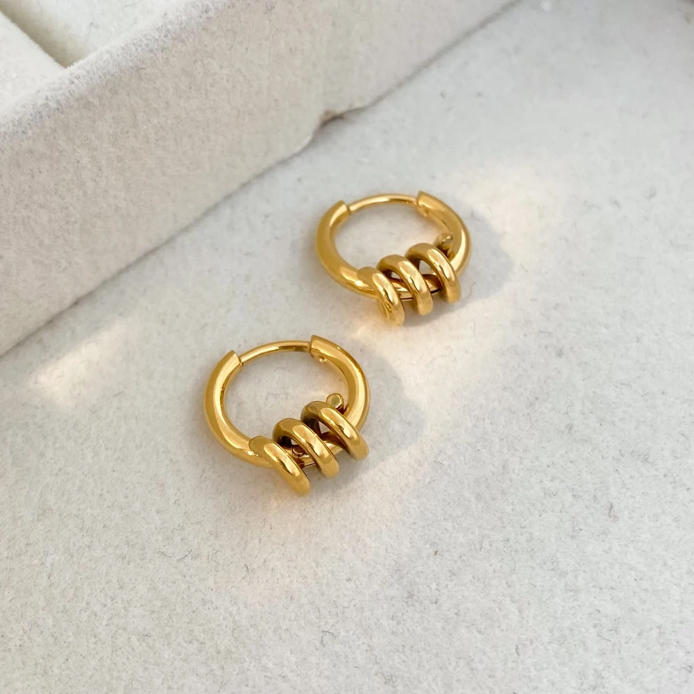 Boucles d'Oreilles Créoles Torsadées – Détail Unique | Twinolo