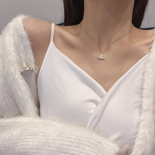 Ketting met Opaal Handtasje – Charmant & Bijzonder | Twinolo