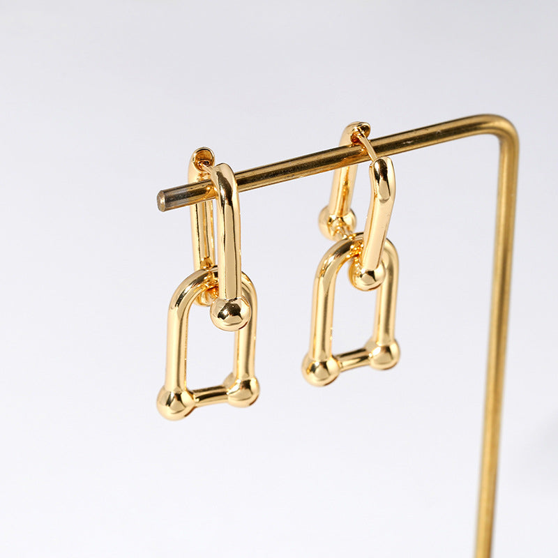 Boucles d'oreilles créoles avec chaîne – Robustes et élégantes | Twinolo
