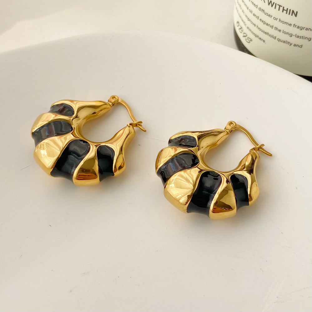 Chunky Hoepels – Gedurfde Eleganties | Twinolo