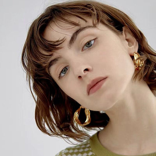 Croissant Oorbellen – Tijdloze Elegantie in Goud | Twinolo