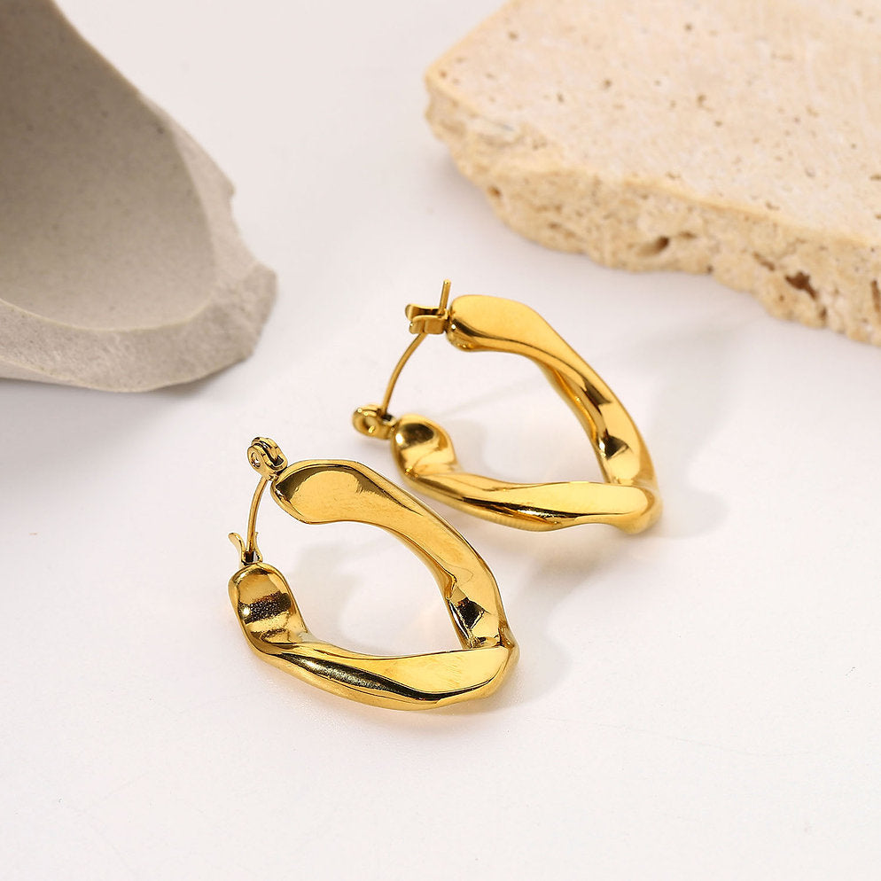 Boucles d'oreilles créoles dorées – Intemporelles et classiques | Twinolo