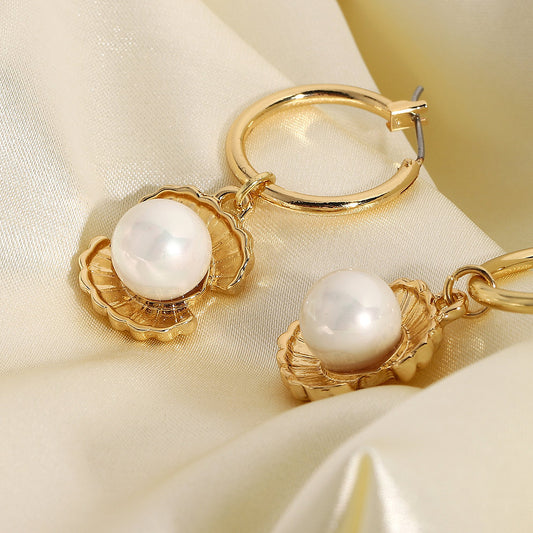 Hoepeloorbellen met Glanzende Parel – Luxe & Elegant | Twinolo