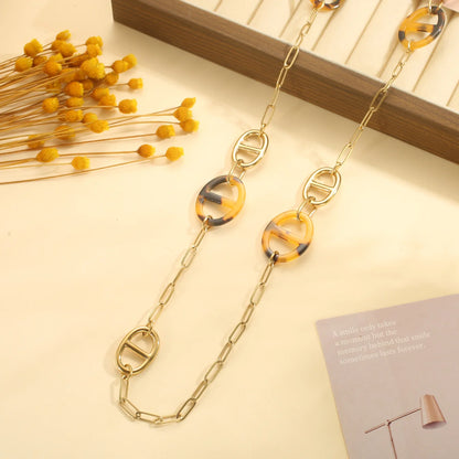 Long Statement Necklace with Resin Details – Gold Coloured – Stainless Steel | TWINOLO
